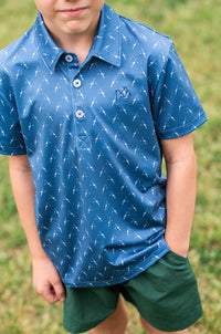 BOY'S SHORT SLEEVE PRO PERFORMANCE POLO IN FISHING ROD PRINT ON BLUE
