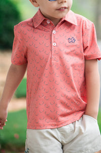 BOY'S SHORT SLEEVE PRO PERFORMANCE POLO IN DEER ANTLER PRINT ON ORANGE