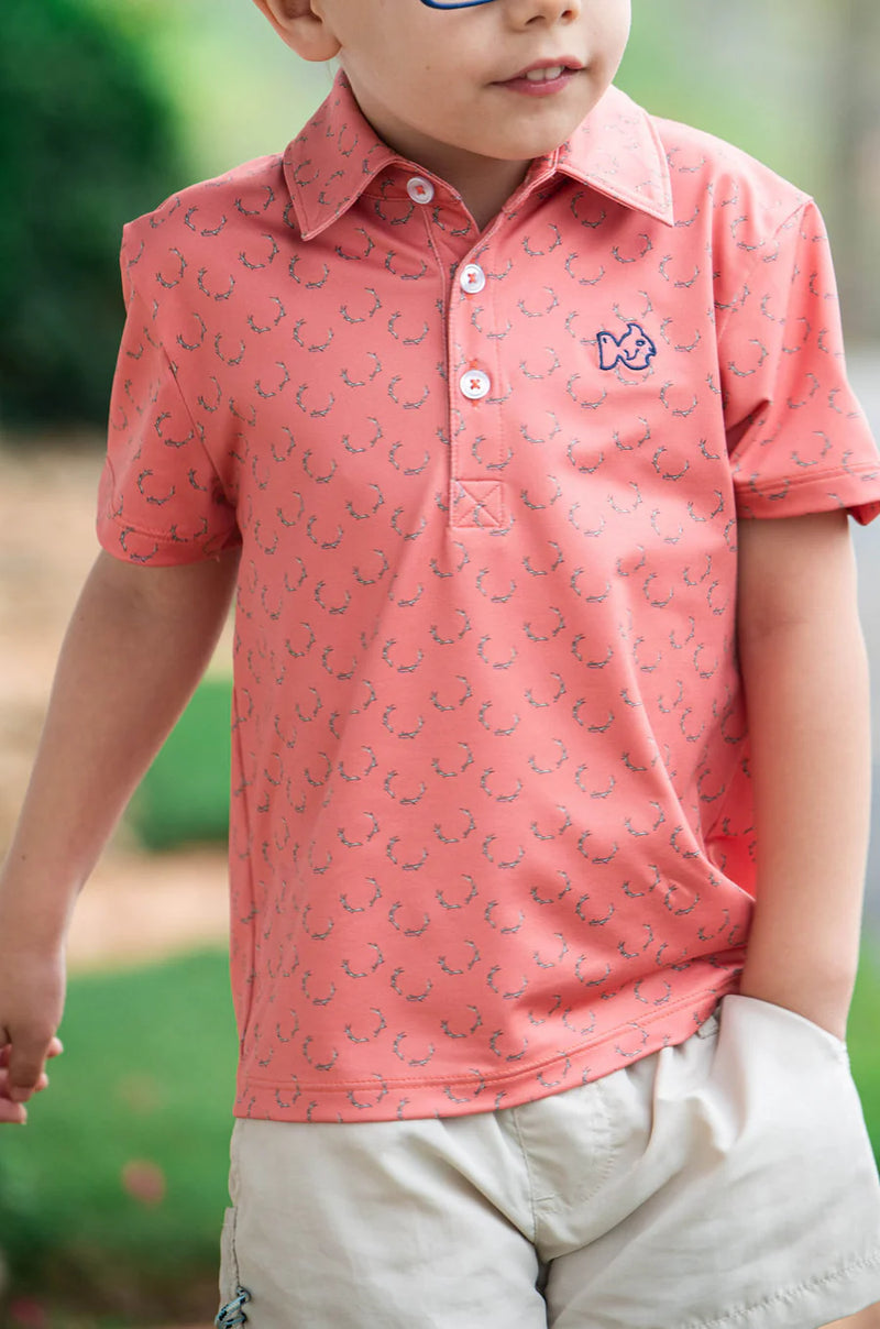 BOY'S SHORT SLEEVE PRO PERFORMANCE POLO IN DEER ANTLER PRINT ON ORANGE