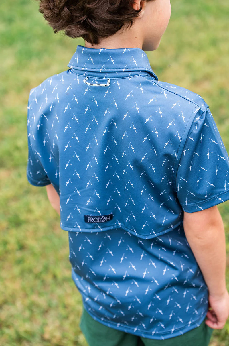BOY'S SHORT SLEEVE PRO PERFORMANCE POLO IN FISHING ROD PRINT ON BLUE
