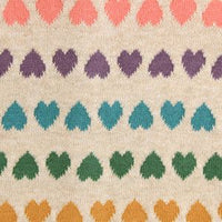 RUFFLE HEM HEARTS SWEATER