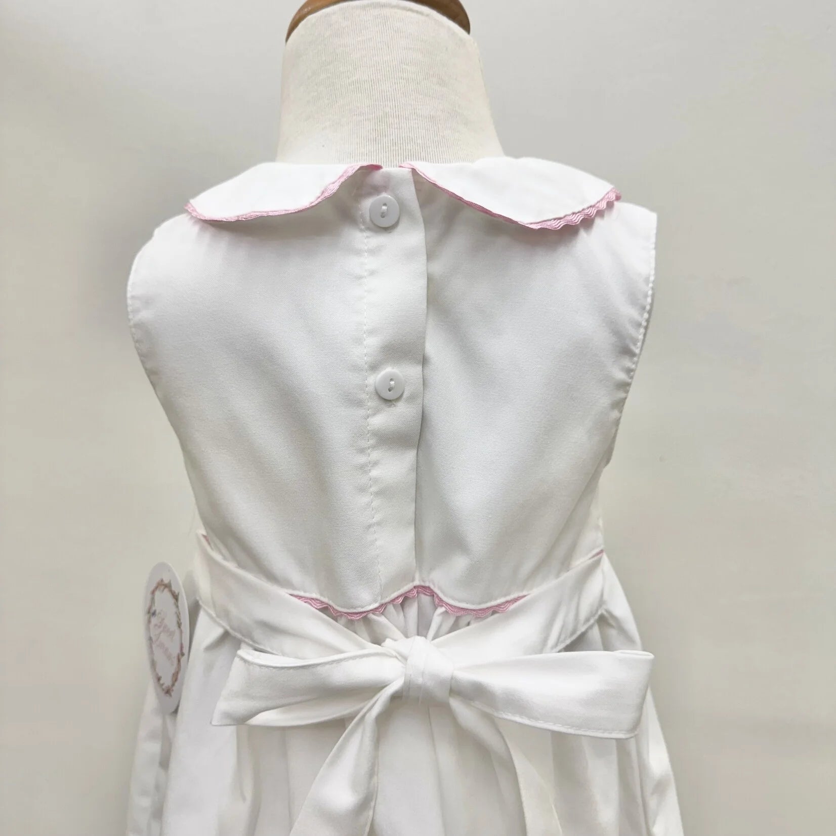 WHITE DRESS WITH PINK EMBROIDERED HYDRANGEA