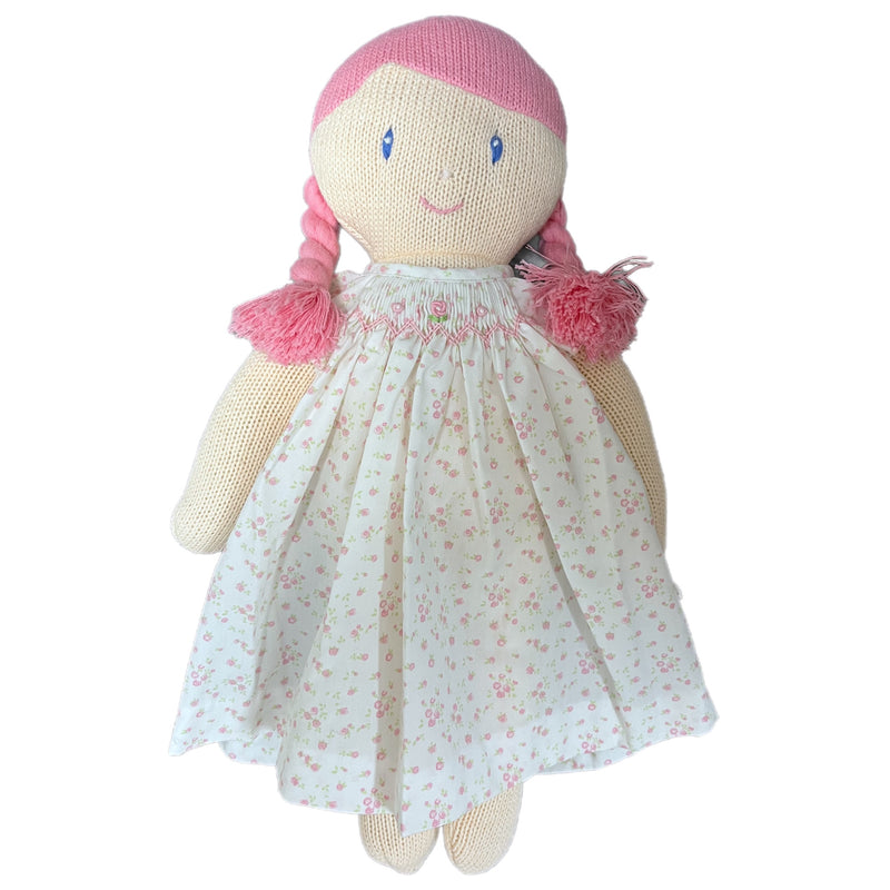 DOLL WITH WHITE AND BLUE POLKA DOT SMOCKED FLOWER DRESS